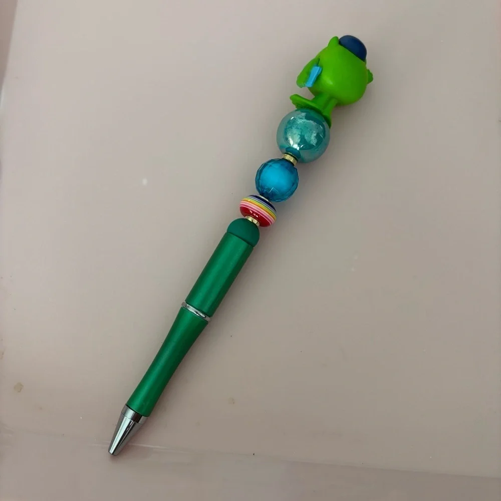 Disney Doorables: Monster INC: Mike with books handmade beaded pen